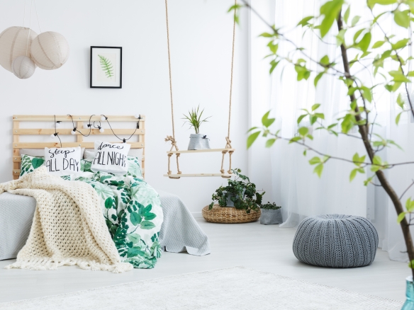 bedroom with gray pouf